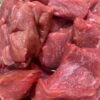 Tender Stew Meat – Grass-Fed & Grain-Finished | Blended Pastures Farmstead Farm-fresh grass-fed, grain-finished stew meat cubes on a rustic wooden board.