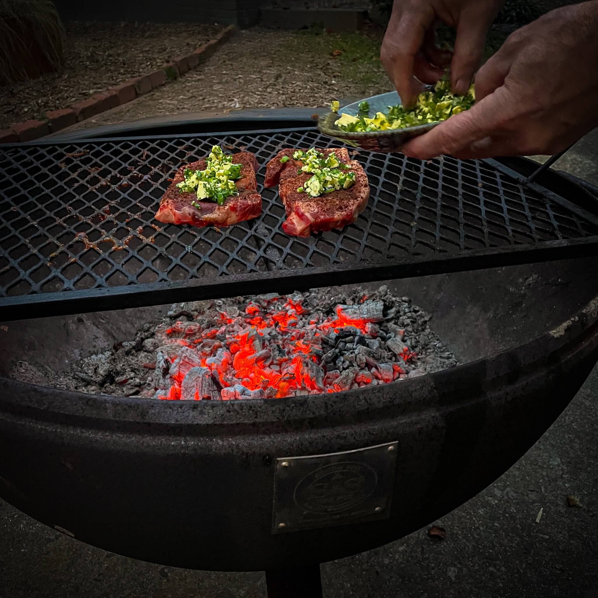 Thick-cut grass-fed, grain-finished ribeye steak with heavy marbling