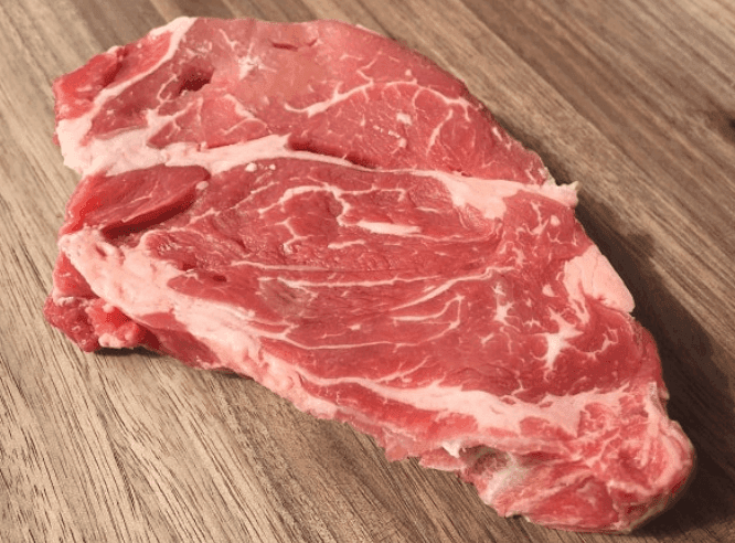 Juicy, tender chuck eye (Delmonico) steak—grass-fed, grain-finished SimAngus beef perfect for grilling or pan-searing.
