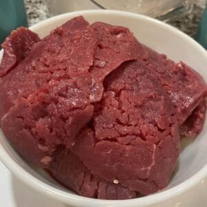 Tenderized grass-fed, grain-finished cubed steak with visible crisscross marks.