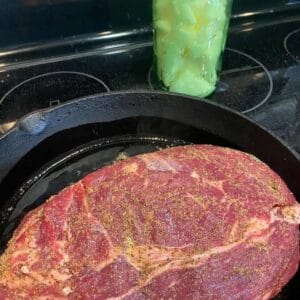 Marbled grass-fed, grain-finished chuck roast ready for slow cooking.
