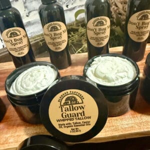 allow Guard bug repellent balm in jar—natural tallow-based insect protection with essential oils.