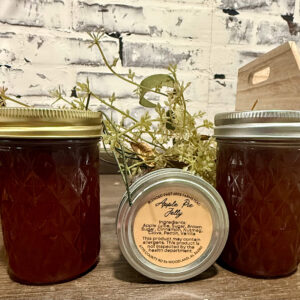 Homemade Apple Pie Jelly in mason jar—sweet, spiced.