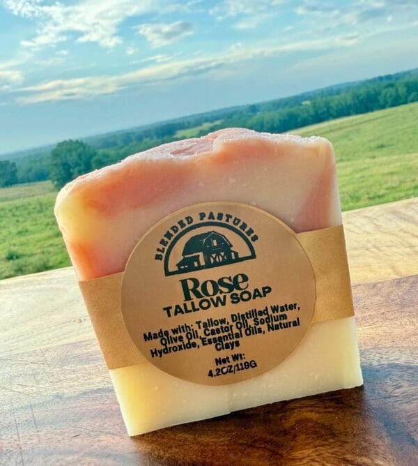 Rose tallow soap bar with petals—hydrating, romantic, and handcrafted.